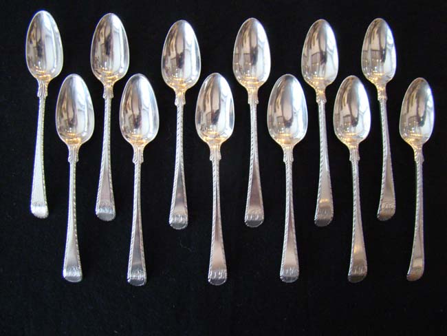 An exceptionally fine and rare set of 12 English 18th century sterling silver teaspoons circa 1775-1785